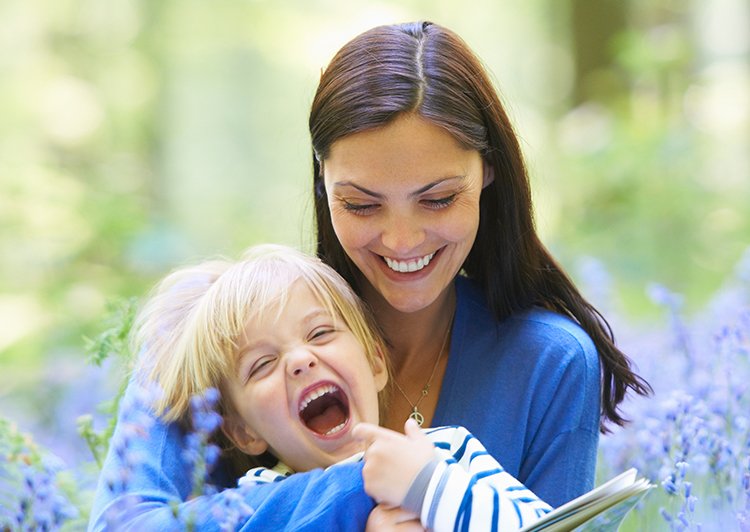 Mother and son playing in a park