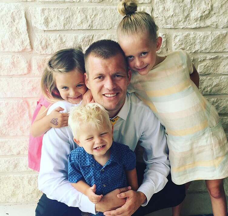 Dr. Tanner Hunsaker and three of his children at Midtown Dental in Logan, Utah