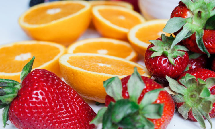 strawberries and oranges help strengthen teeth