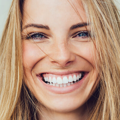 a young woman smiling