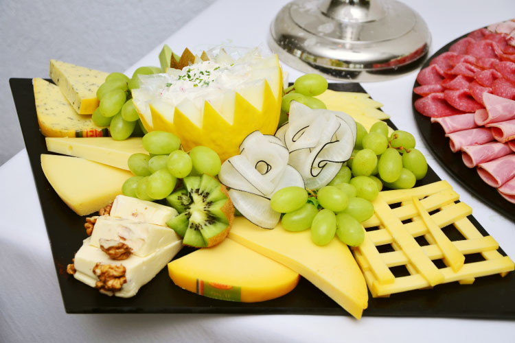 Closeup of a cheese platter for a summer barbecue