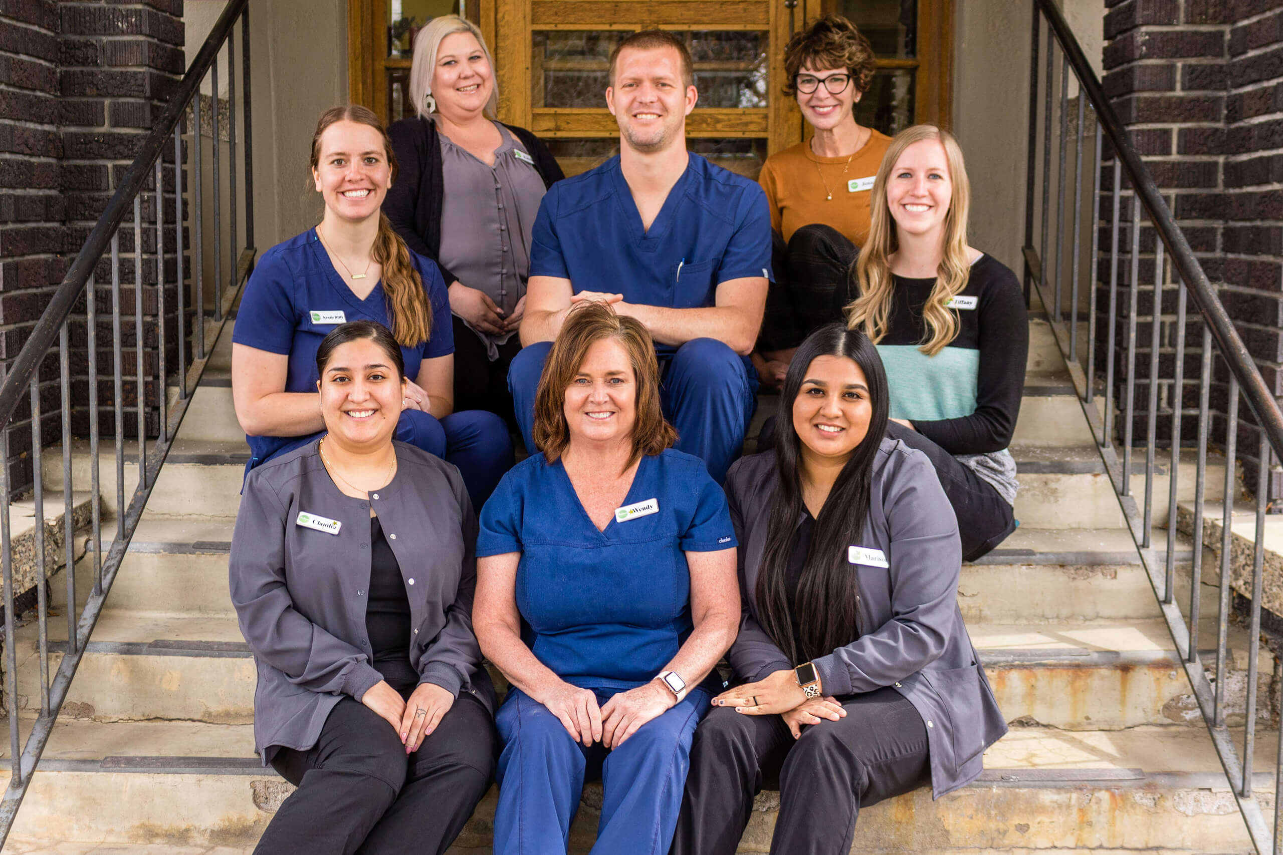 Dentist in Logan, Dr. Tanner Hunsaker and his dental team group photo at Midtown Dental in Logan, Utah