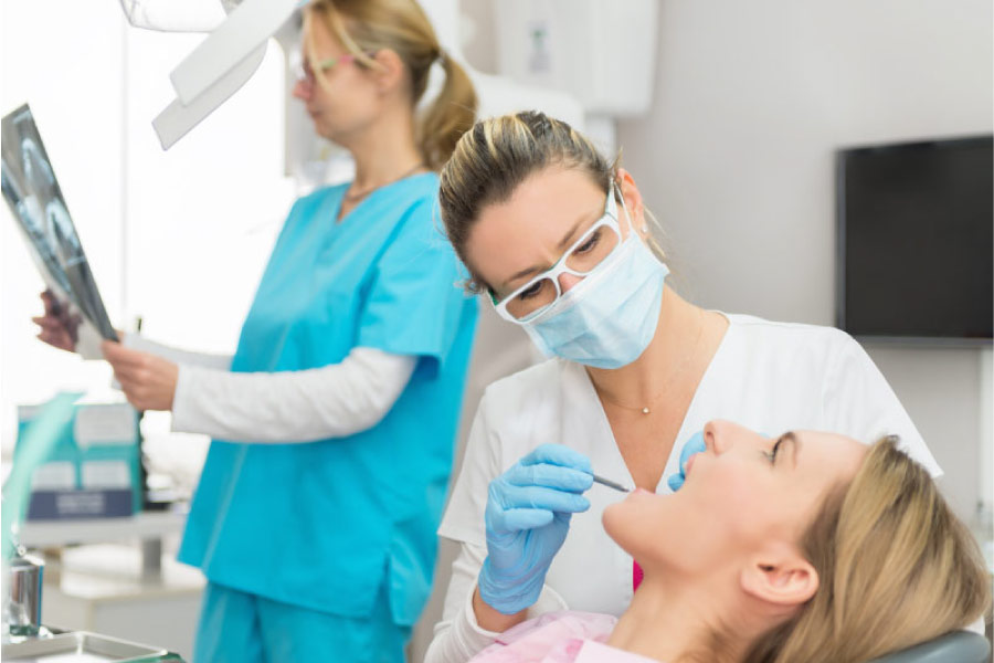 woman at the dentist getting a composite dental filling